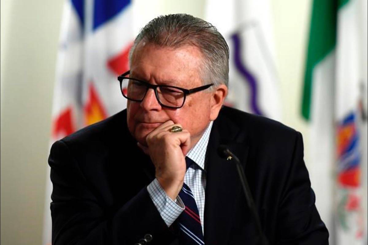 Minister of Public Safety and Emergency Preparedness Ralph Goodale listens to RCMP Commissioner Brenda Lucki, not shown, during a press conference on the RCMP’s new Interim Management Advisory Board in Ottawa on Wednesday, Jan. 16, 2019. (Justin Tang/The Canadian Press)