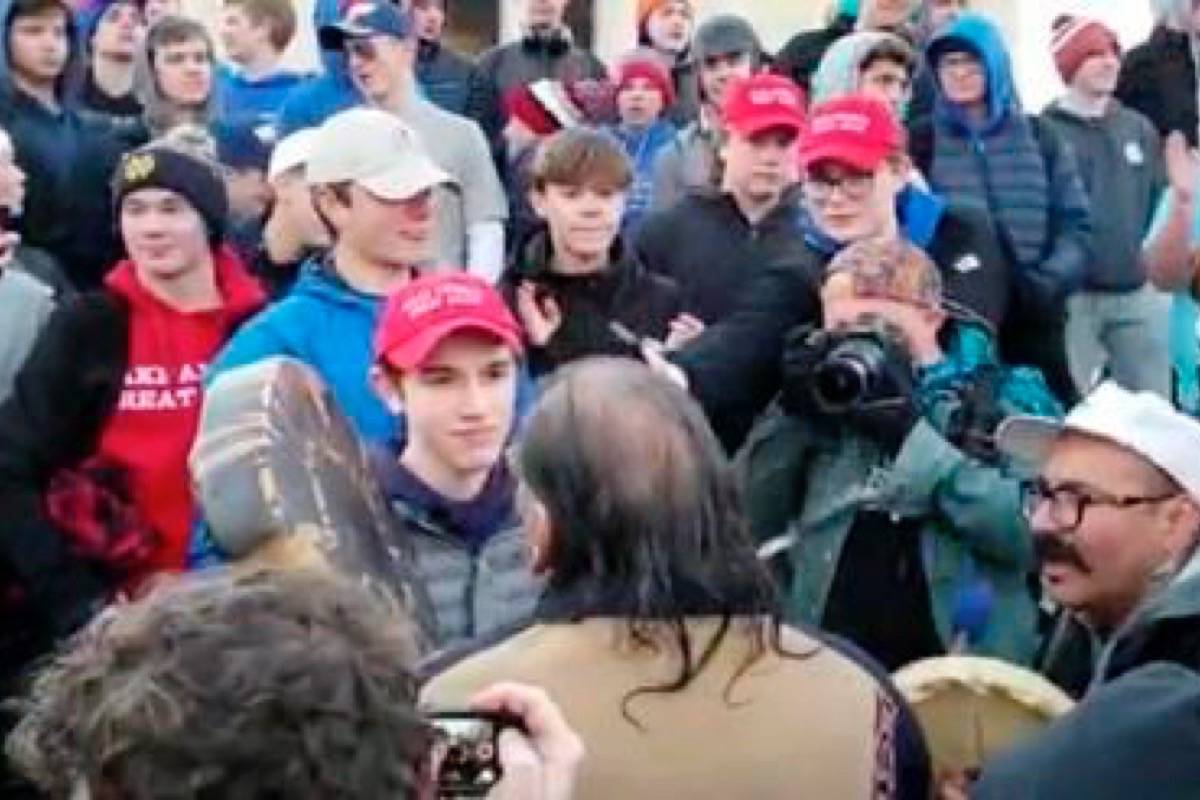 A still from a video showing confrontation between Native American protesters and students from the Covington Catholic High School. (Instagram)