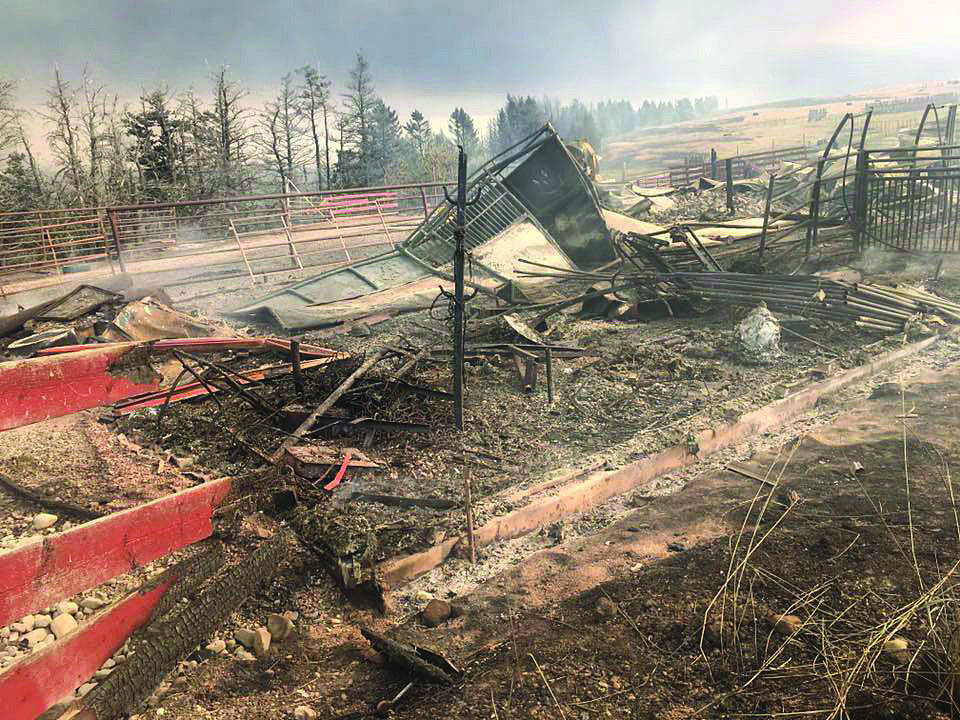 Fire damage to the Rocking Heart Ranch just outside Waterton Lakes National Park is shown in a handout photo. With a forecast calling for rain for the next few days, crews fighting a wildfire in Waterton Lakes National Park and the surrounding area in southern Alberta have some reason for optimism. THE CANADIAN PRESS/HO-Sierra Garner