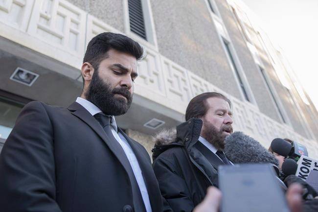 Jaskirat Singh Sidhu leaves provincial court with his lawyer Mark Brayford, right, in Melfort, Sask., on January, 8, 2019. (THE CANADIAN PRESS/Kayle Neis)