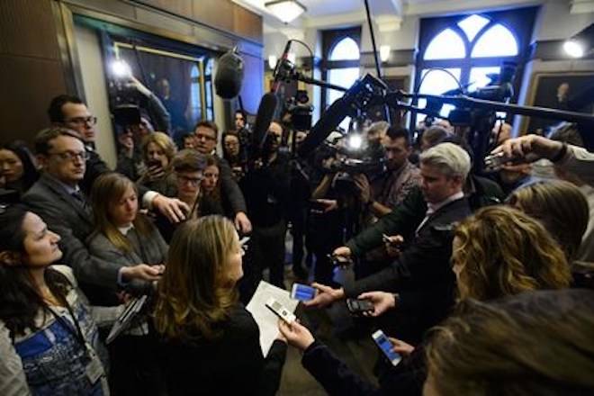 Minister of Foreign Affairs Chrystia Freeland talks to media as she makes here way through the foyer of the House of Commons in the West Block of Parliament Hill as she arrives for question period in Ottawa on Monday, Jan. 28, 2019. THE CANADIAN PRESS/Sean Kilpatrick