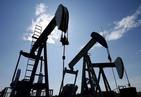 Pumpjacks are shown pumping crude oil near Halkirk, Alta., on June 20, 2007. (THE CANADIAN PRESS/Larry MacDougal)