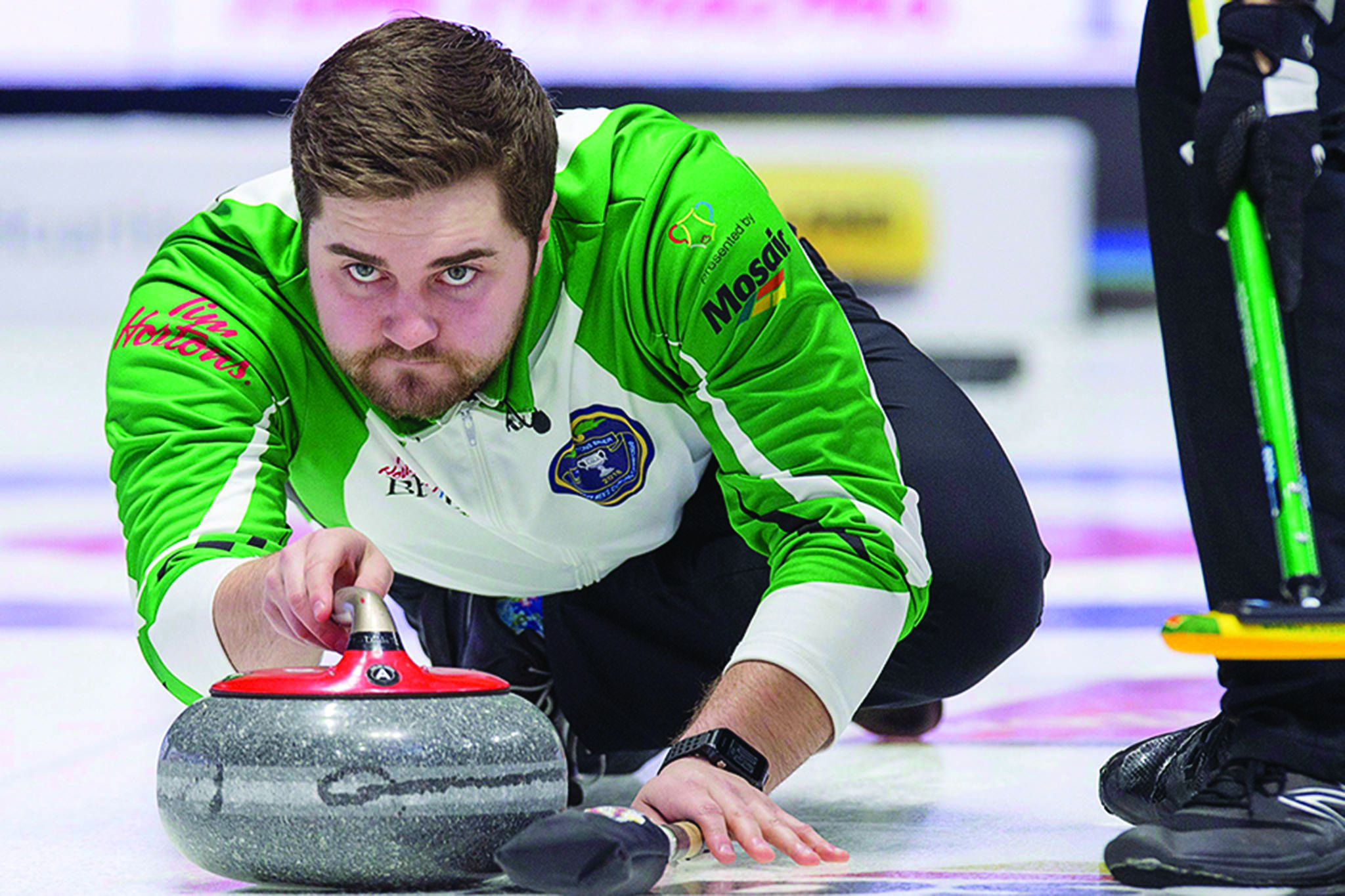 Saskatchewan third Matt Dunstone, who throws fourth rocks, releases a shot as they play Manitoba at the Tim Hortons Brier curling championship at the Brandt Centre in Regina on Sunday, March 4, 2018. THE CANADIAN PRESS/Andrew Vaughan