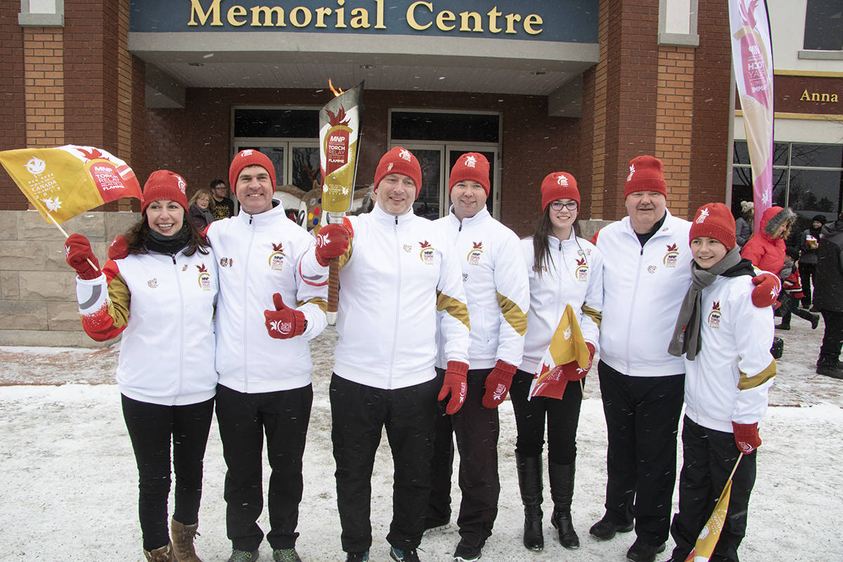 MP Blaine Calkins, Mayor Grant Creasey, Reid Wilson, Larry Michielsen, Patricia Nelson, Mackenzie Van Damme and Tyler Graham were the torchbearers for the MNP Canada Games Torch Relay in Lacombe on Feb. 2nd, 2019. Todd Colin Vaughan/Lacombe Express