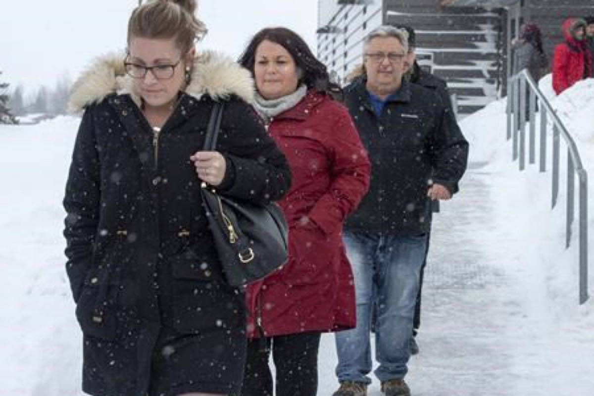 Christina Haugan, left, wife of coach Darcy Haugan who died in the 2018 Humboldt hockey team bus crash, and other family and friends of victims leave after the final arguments in the sentencing hearings for Jaskirat Singh Sidhu, the driver of the truck that collided with the bus carrying the Humboldt Broncos hockey team, at the courthouse in Melfort, Sask., on January 31, 2019. (Ryan Remiorz/The Canadian Press)
