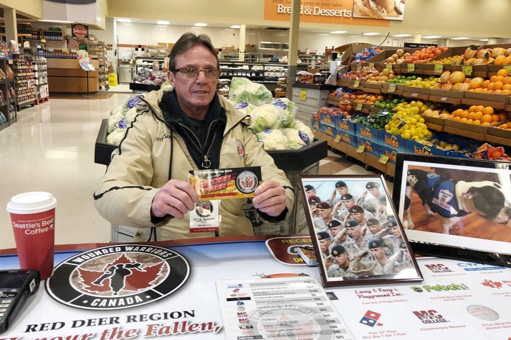 Richard Arnott, a volunteer with Wounded Warriors Canada, was at the Sobeys on Gaetz south Monday selling Action Pack coupon booklets for $25. The coupon booklets are being sold at Sobeys until Thursday and then at Walmart in the north until Sunday. Robin Grant/Red Deer Express