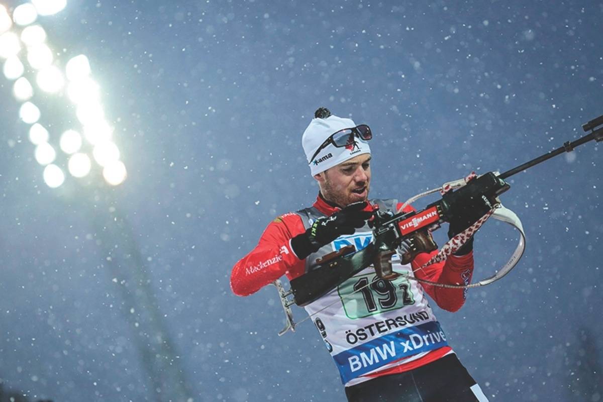 Canada’s Nathan Smith in action during the single mixed relay event at the IBU Biathlon World Cup in Ostersund, Sweden, Sunday Nov. 29, 2015. If you drive from Banff up to Norquay Ski Resort in the summer, you may see biathlete Nathan Smith doing a full-out climb on his roller skis. (Marie Birkl/The Canadian Press)