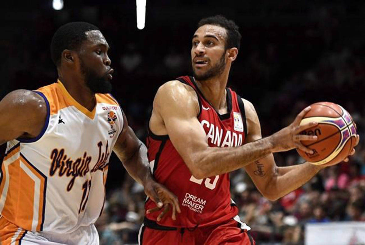 Canada’s Phil Scrubb (23) looks for a way to the net against Virgin Islands’ Ivan Aska (11) during first half FIBA Basketball World Cup 2019 Americas Qualifiers action, in Ottawa on Monday, July 2, 2018. Two-time NBA champion Joel Anthony, and brothers Phil and Thomas Scrubb headline Canada’s team for its final qualifying games for this summer’s FIBA World Cup. (Justin Tang/The Canadian Press)