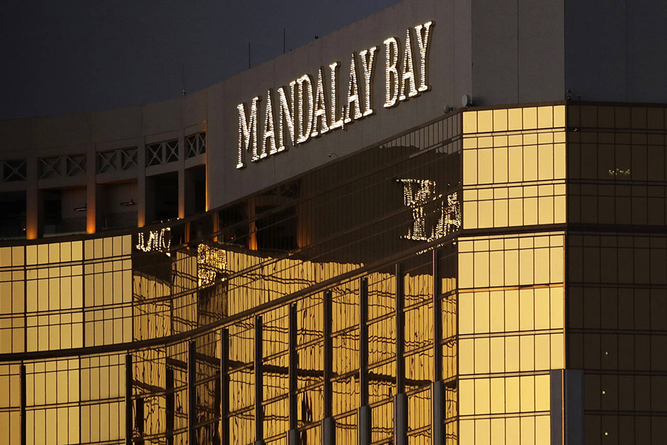 FILE - In this Oct. 3, 2017, file photo, windows are broken at the Mandalay Bay resort and casino in Las Vegas, the room from where Stephen Craig Paddock fired on a nearby music festival, killed 58 and injuring hundreds on Oct. 1. (AP Photo/John Locher, File)