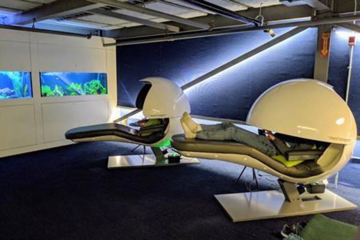 A Google Canada employee reclines on one of two nap pods at its offices in Kitchener, Ont., in this undated handout photo. Google Canada spokesman Aaron Brindle says nap rooms can be found in the tech giant’s offices around the world, including the Toronto office where a wellness space for nursing mothers can be reserved for taking a break, or taking a nap. Another space at their engineering headquarters in Kitchener, Ont., features two high-tech recliners with large spherical privacy visors for extra-tired employees looking to grab some shut-eye. (Google Canada/The Canadian Press)