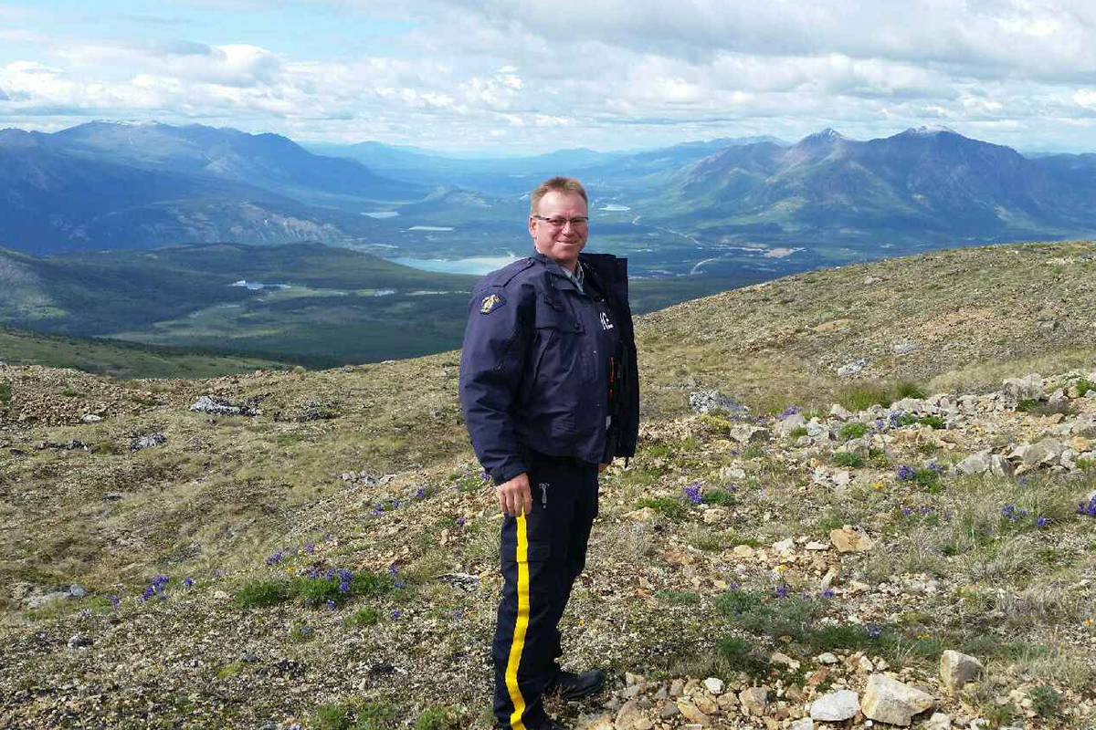 Mountie Brad MacCallum, pictured here in the Yukon recently, helped prevent an alleged bank robbery on his day off. His quick-thinking diffused the situation. Photo submitted