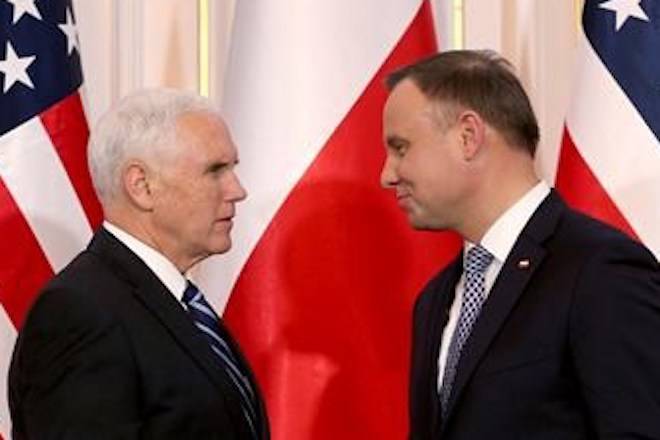 United States Vice President Mike Pence, left, and Poland’s President Andrzej Duda, right, shake hands after a joint statement as part of a meeting at Belvedere palace in Warsaw, Poland, Wednesday, Feb. 13, 2019. (AP Photo/Michael Sohn)