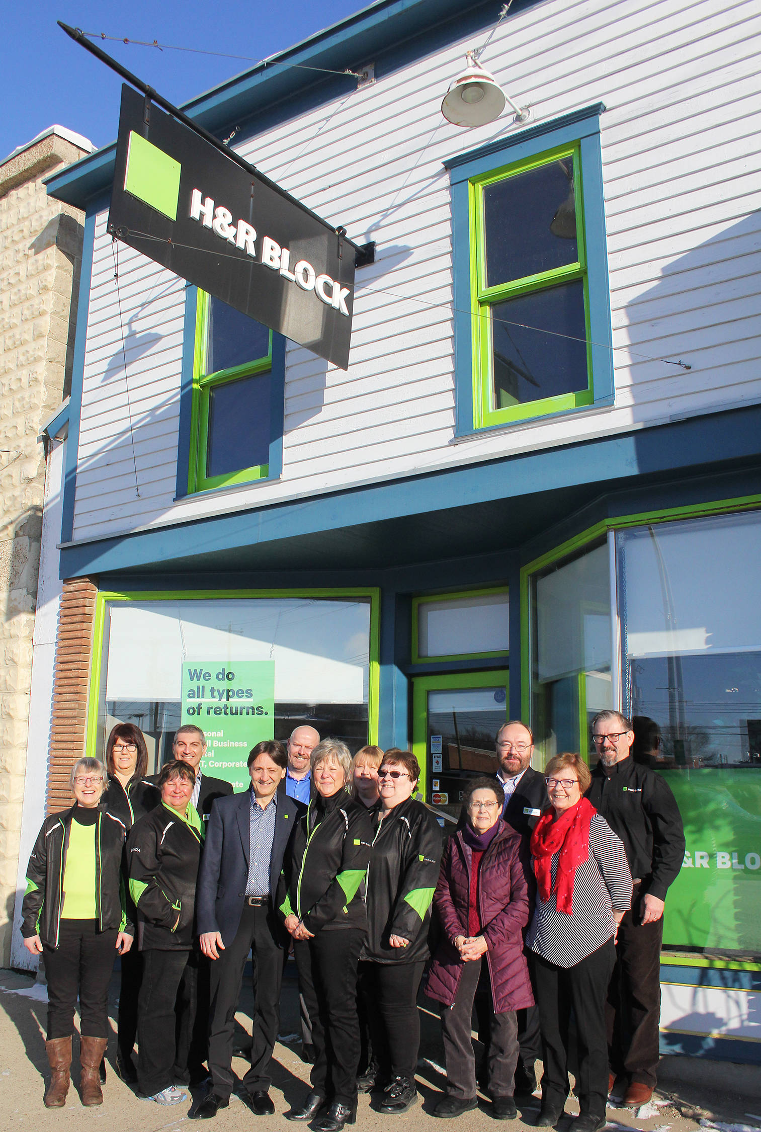 After 45 years of business in town, Ponoka’s H&R Block held a special celebration Thursday with cake and coffee for clients. The celebration is significant enough that the company president visited with company executives. Pictured in the photo are (l-r) Ursula Hefti, tax preparer; Gena Whiting, client service leader; Brenda Hulsman; senior tax pro; Altaf Hirji, AVP retail operations; Peter Bruno, president; Rob Conway, vp operations; Cecile Wahl, owner/operator; Tracy Taylor, district district manager; Joyce Vopni, tax pro; Jean Hastie, client; John Hickerson, director of franchise development plus Camrose franchise owners Janice and Allen Zimmerman.                                Photo by Jeffrey Heyden-Kayep[;