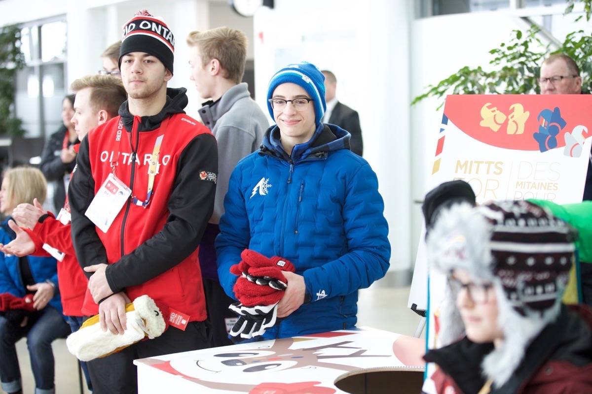 Canada Winter Games athletes prepare to donate mittens to the Mitts for Many Program that launched Saturday morning at the Gary W. Harris Centre. Robin Grant/Red Deer Express