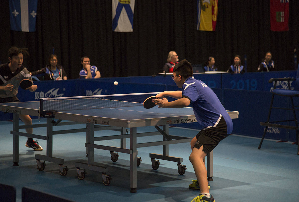 Team Alberta’s Anthony Chen and Daniel Jiang compete in table tennis Saturday at Westerner Park. Robin Grant/Red Deer Express