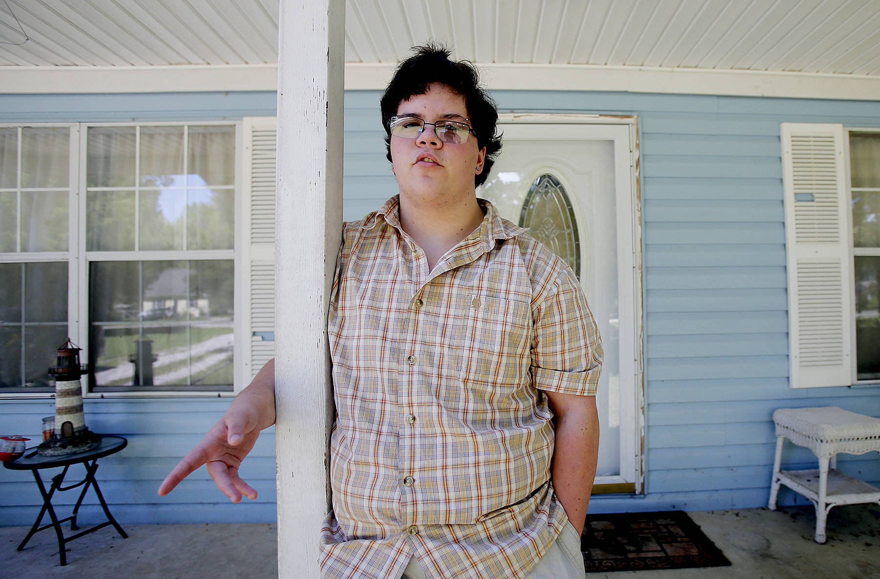 FILE - In this Aug. 22, 2016 file photo, transgender high school student Gavin Grimm poses in Gloucester, Va. The Supreme Court is returning a transgender teen’s case to a lower court without reaching a decision. The justices said Monday, March 6, 2017, they have opted not to decide whether federal anti-discrimination law gives high school senior Gavin Grimm the right to use the boys’ bathroom in his Virginia school. (AP Photo/Steve Helber, File)