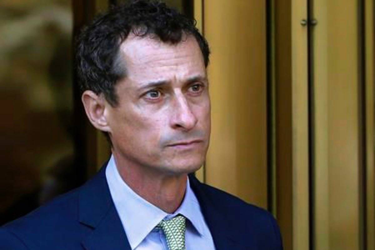 FILE - In this Sept. 25, 2017 file photo, former Congressman Anthony Weiner leaves federal court following his sentencing in New York. Weiner has been released from federal prison in Massachusetts. The New York Democrat, a once-rising star who also ran for mayor, was convicted of having illicit online contact with a 15-year-old North Carolina girl in 2017. (AP Photo/Mark Lennihan, File)