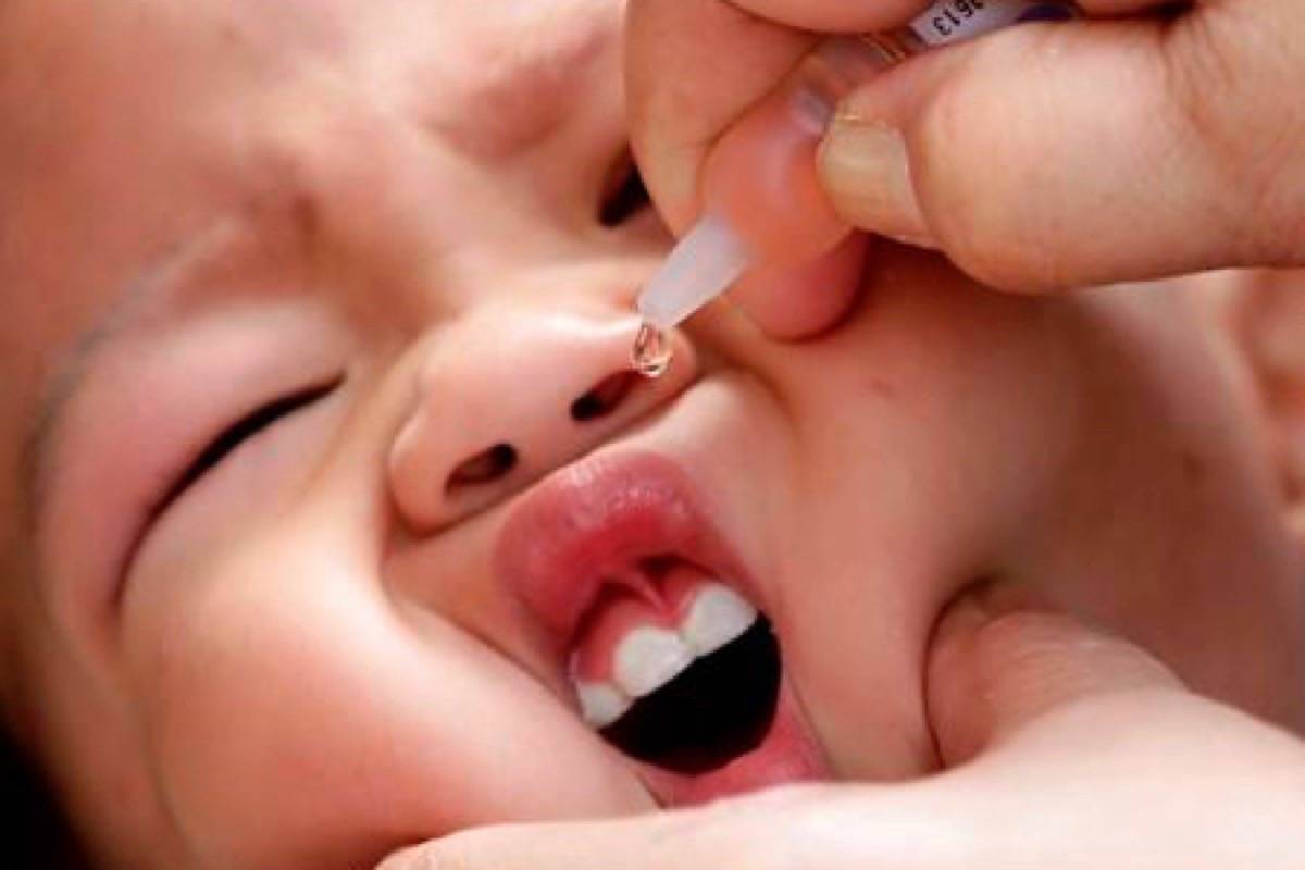 FILE - In this Friday, Sept. 12, 2014, file photo, a local health worker administers a vaccine to a baby at a local health center at the financial district of Makati, east of Manila, Philippines. The World Health Organization and the British government are working with the Philippine Department of Health, UNICEF and a host of other partners to help deliver a month-long campaign to immunize children against Measles, Rubella, commonly known as German measles and Polio which aims to immunize 13 million children nationwide. (AP Photo/Bullit Marquez, File)