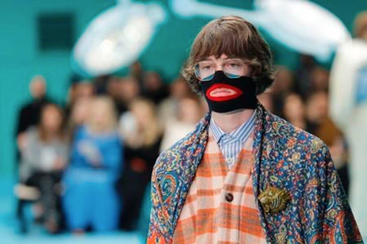 FILE - In this Feb. 21, 2018, file photo, a model wears a creation as part of the Gucci women’s Fall/Winter 2018-2019 collection, presented during the Milan Fashion Week, in Milan, Italy. Gucci, which designed this face warmer, reminiscent of blackface prompted an instant backlash from the public and forced the company to apologize publicly on Wednesday, Feb. 6, 2019. (AP Photo/Antonio Calanni, File)