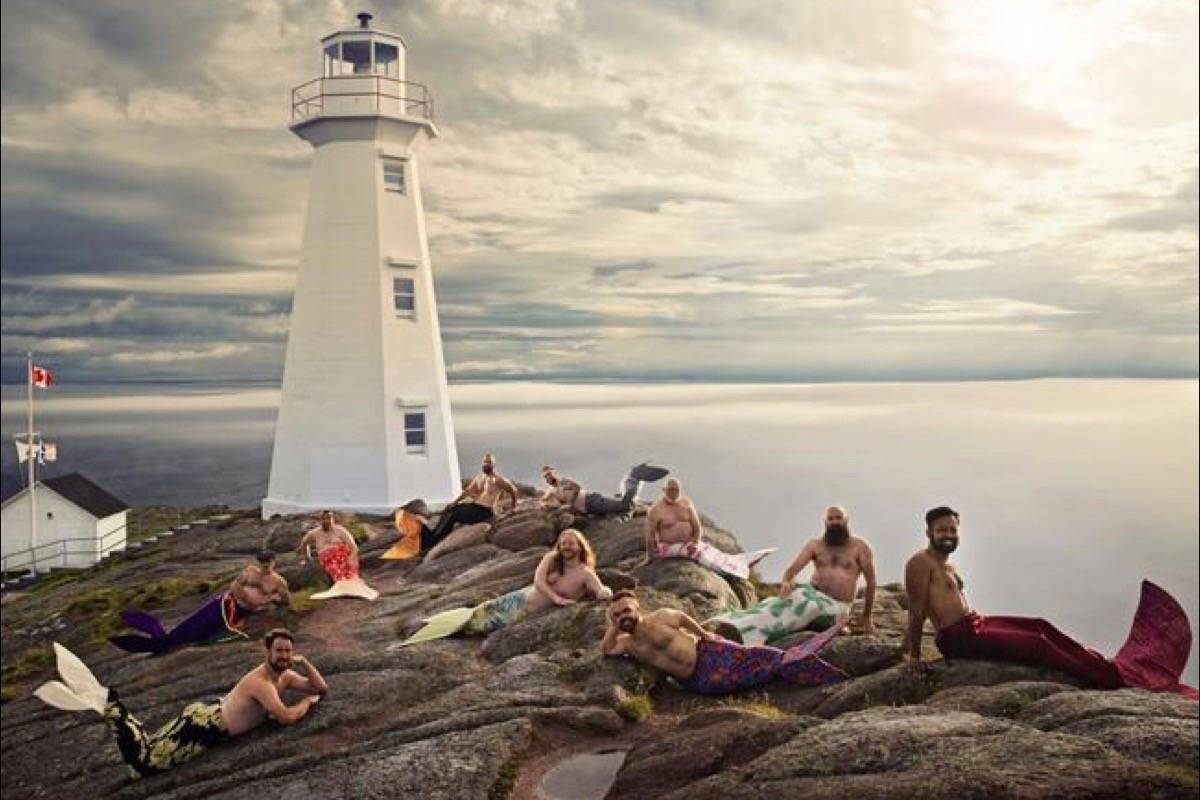 Men from the Newfoundland and Labrador Beard and Moustache Club pose as mermaids at Cape Spear Lighthouse National Historic site in this undated handout photo. What started as a dare for a burly Newfoundland man to pose in mermaid flippers has turned into a globally known effort to combat gender stereotypes, and raised more than a half million dollars for charity. (THE CANADIAN PRESS/HO, Roth and Ramberg Photography)