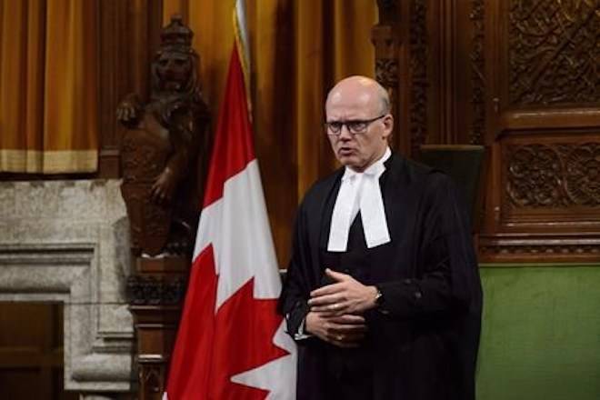 Speaker of the House of Commons of Canada Geoff Regan stands during question period in the House of Commons on Parliament Hill in Ottawa on Tuesday, Sept. 25, 2018. Regan has apologized for an apparent incident of racial profiling on Parliament Hill, saying all who visit the precinct must be treated with fairness, dignity and respect. THE CANADIAN PRESS/Sean Kilpatrick