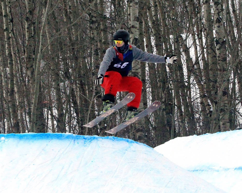 Christ Arsenault of the Yukon digs in to hit this trick off the Volcano jump during the qualification runs in the men’s freestyle skiing slopestyle event Feb. 20th at Canyon Ski Resort. Photo by Jordie Dwyer/Black Press News Services