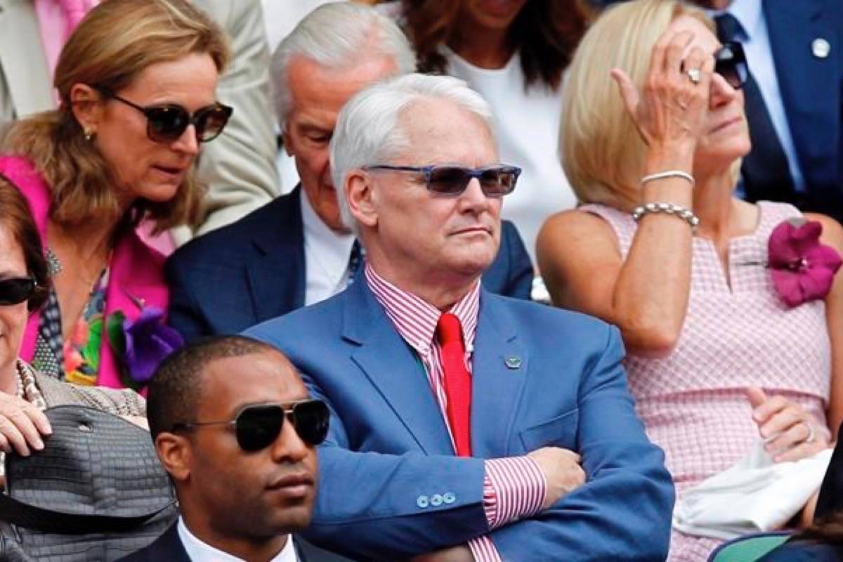 Canada’s High Commissioner to London Gordon Campbell, centre, sits in the Royal Box on centre court prior to the women’s singles final between Eugenie Bouchard of Canada and Petra Kvitova of the Czech Republic at the All England Lawn Tennis Championships in Wimbledon, London, Saturday July 5, 2014. (THE CANADIAN PRESS/AP-Sang Tan)