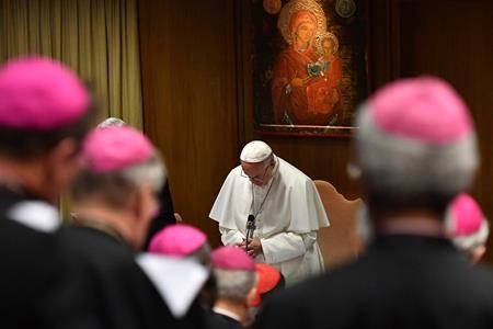 Pope Francis prays during the opening of a sex abuse prevention summit, at the Vatican, Thursday, Feb. 21, 2019. (Vincenzo Pinto/Pool Photo via AP)