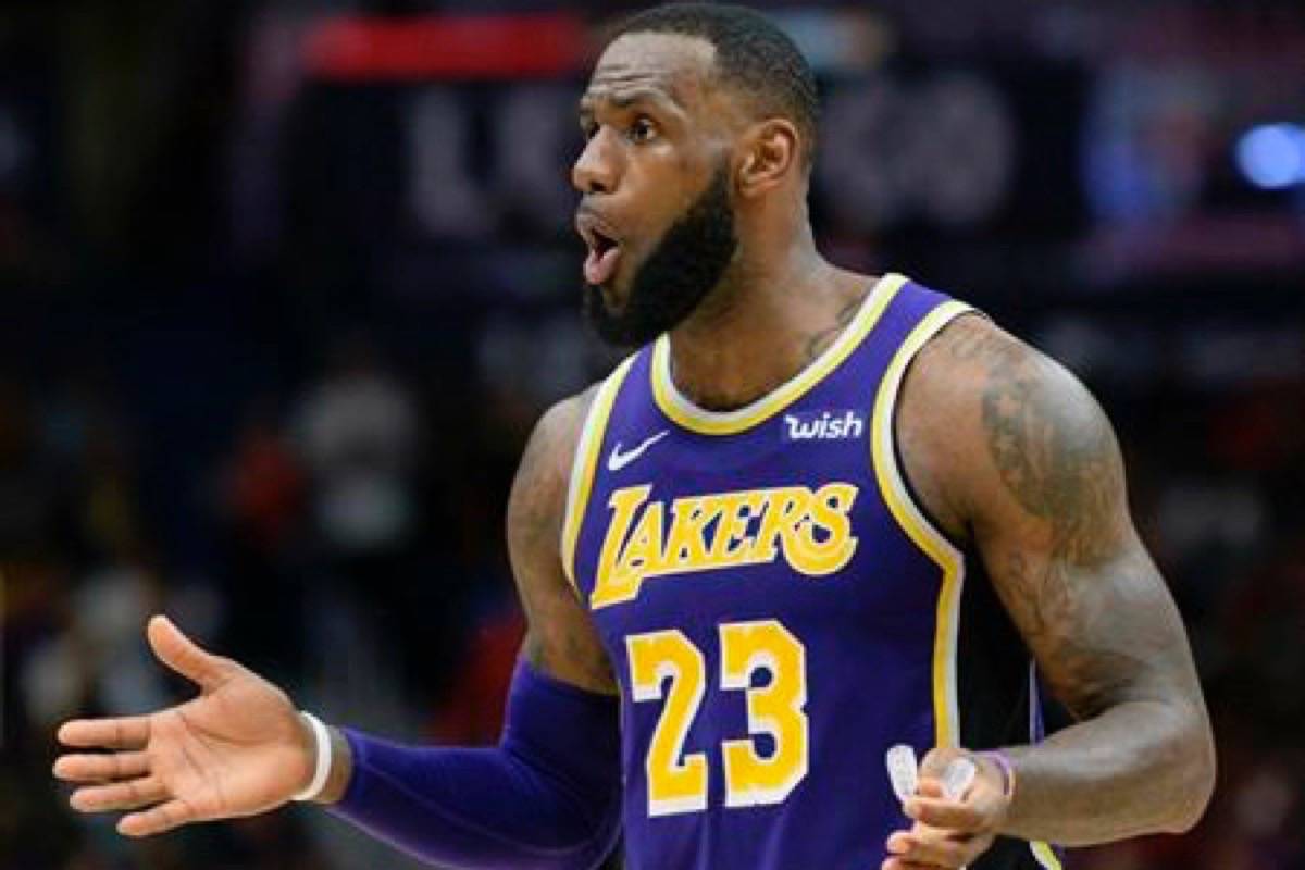 Los Angeles Lakers forward LeBron James (23) reacts to a call against the New Orleans Pelicans in the second half of an NBA basketball game in New Orleans, La. Saturday, Feb. 23, 2019. (AP Photo/Matthew Hinton)