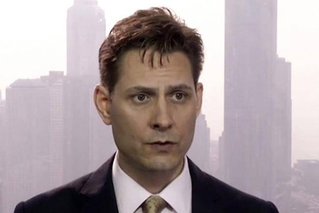 Michael Kovrig, an adviser with the International Crisis Group, a Brussels-based non-governmental organization, speaks during an interview in Hong Kong, as seen in this image made from a video taken on March 28, 2018. (THE CANADIAN PRESS/AP, File)