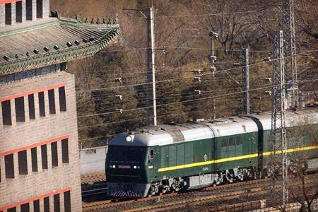 Mirroring grandfather, Kim rides the rails to Trump summit