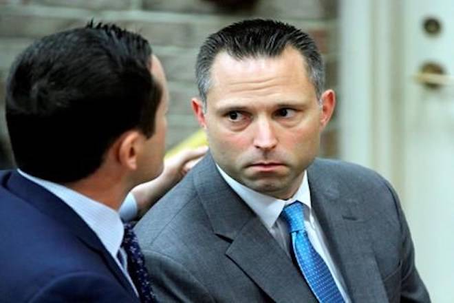 FILE - In this June 12, 2018 file photo, Thomas Tramaglini, right, the Kenilworth Schools superintendent accused of defecating on the track at Holmdel High School, makes his initial appearance in Holmdel Municipal Court in Holmdel, N.J. (Thomas P. Costello/The Asbury Park Press via AP, Pool)