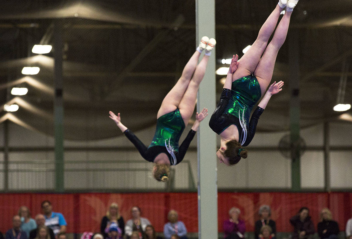 Saskatchewan’s Ashley Anaka and Hannah Metheral took home the gold medal in the women’s synchro trampoline competition Thursday. Robin Grant/Red Deer Express
