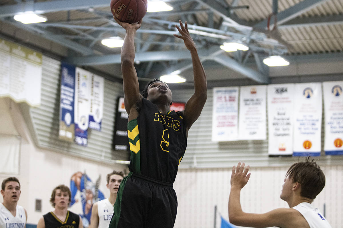 Lubenson Pannebecker and the Lacombe Rams upset the Hunting Hills High School Lighting 61-51 in City Semifinal action on Feb. 28th, 2019. Todd Colin Vaughan/Lacombe Express