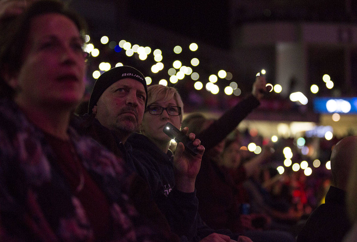 Spectators join in by holding up phone flashlights during musical performances. Robin Grant/Red Deer Express