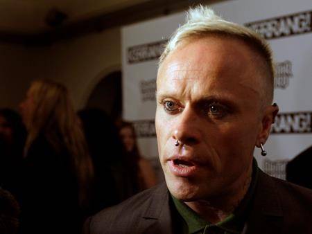 British musician Keith Flint of Prodigy talks to the media after winning the best single for ‘Omen’ at the Kerrang Awards at the Brewery in London on Aug. 3, 2009 (AP Photo/Joel Ryan, FILE)