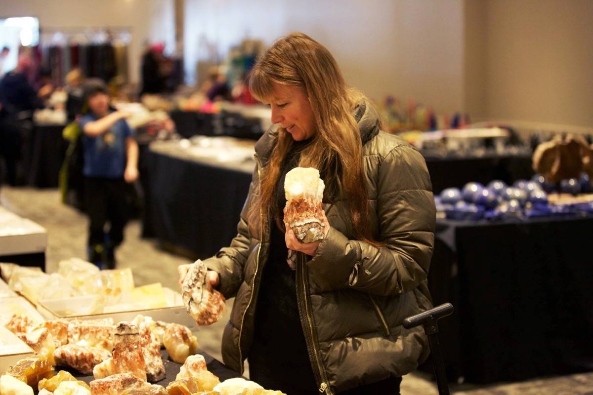 Sandy Mulroy from Cochrane peruses the gems Wednesday morning at the Red Deer Rockn’ Gem Show. Robin Grant/Red Deer Express