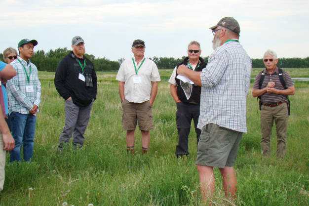 Ducks Unlimited Marshkeepers volunteers enjoy a field tour in the Camrose area. Marshkeepers is a hands-on program that lets volunteers participate in projects that make a difference to the region’s habitat.