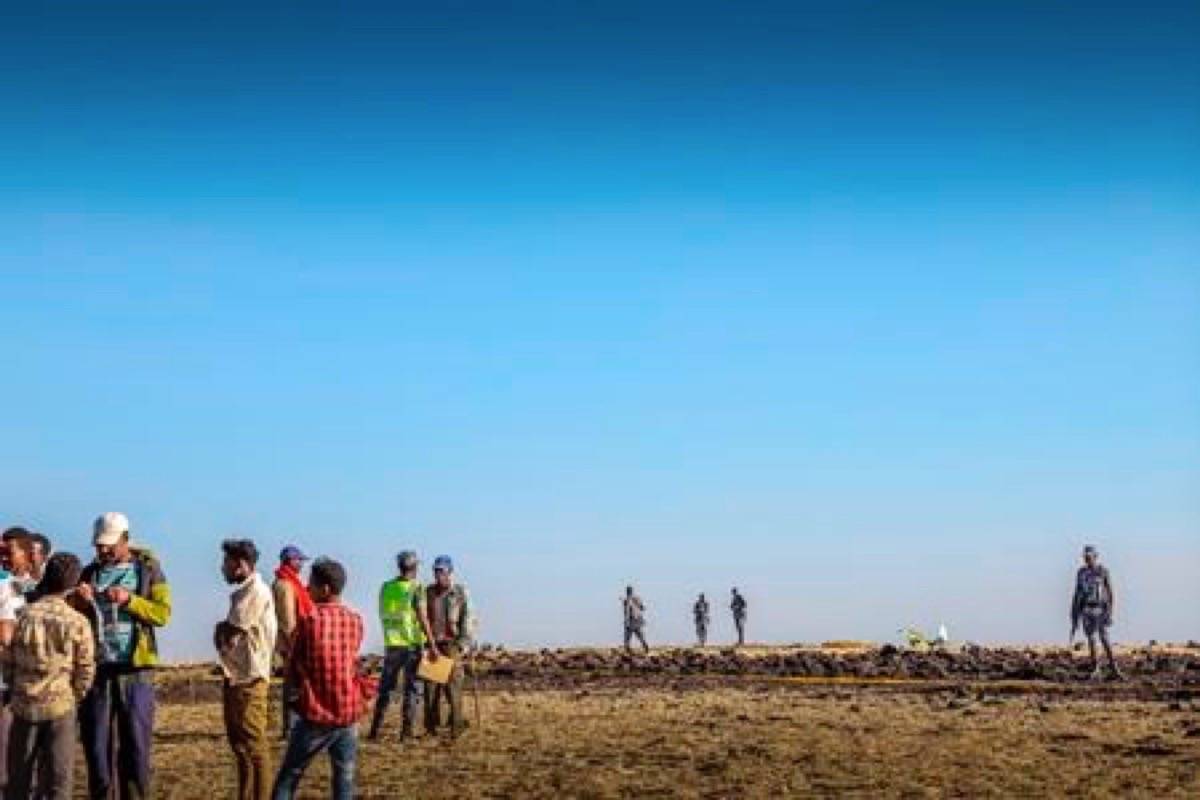 Rescuers search at the scene of an Ethiopian Airlines flight that crashed shortly after takeoff at Hejere near Bishoftu, or Debre Zeit, some 50 kilometers (31 miles) south of Addis Ababa, in Ethiopia Sunday, March 10, 2019. The Ethiopian Airlines flight crashed shortly after takeoff from Ethiopia’s capital on Sunday morning, killing all 157 on board, authorities said, including 18 Canadians. THE CANADIAN PRESS/AP
