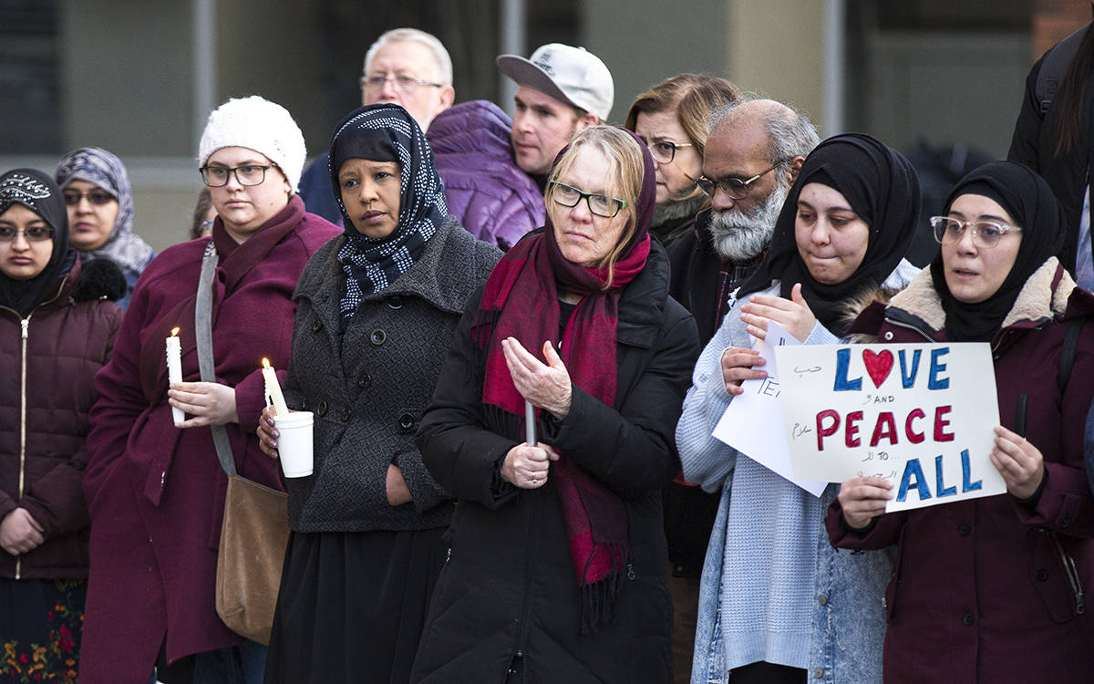 Red Deerians gathered outside City Hall to mourn the 50 people killed in the double mosque shooting in Christchurch, New Zealand on Saturday night. Robin Grant/Red Deer Express