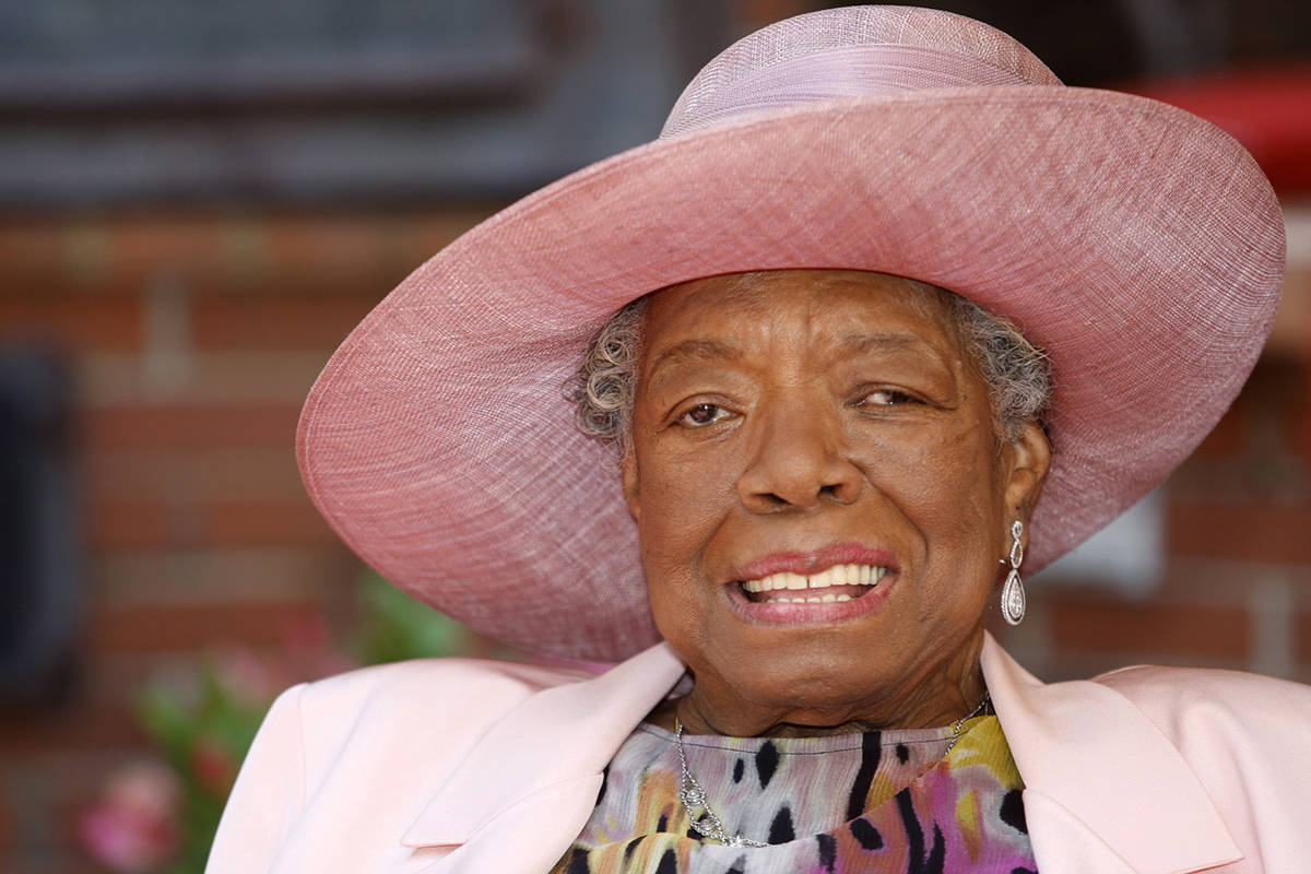 FILE - In this May 20, 2010 file photo, poet Maya Angelou smiles as she greets guests at a garden party at her home in Winston-Salem, N.C. How we address our elders and why set off a social media debate recently after a Los Angeles scriptwriter tweeted an old TV clip of Angelou rebuking a young woman for calling her by her first name. (AP Photo/Nell Redmond, File)