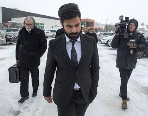 Jaskirat Singh Sidhu, the driver of the truck that collided with the bus carrying the Humboldt Broncos hockey team leaves closing arguments at his sentencing hearing in Melfort, Sask., on January 31, 2019. THE CANADIAN PRESS/Ryan Remiorz
