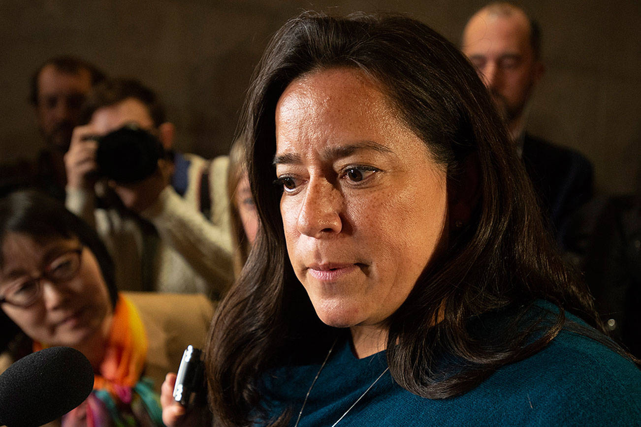 FILE - In this Feb. 27, 2019, file photo, Jody Wilson-Raybould speaks with the media after appearing in front of the Justice committee in Ottawa, Ontario. (Adrian Wyld/The Canadian Press via AP, File)
