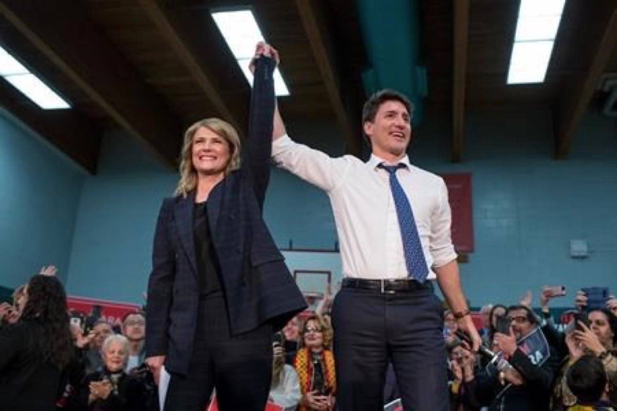 Prime Minister Justin Trudeau and Tamara Taggart speak to supporters at a Liberal nomination event in Vancouver, B.C., on Sunday March 24, 2019. THE CANADIAN PRESS/Ben Nelms