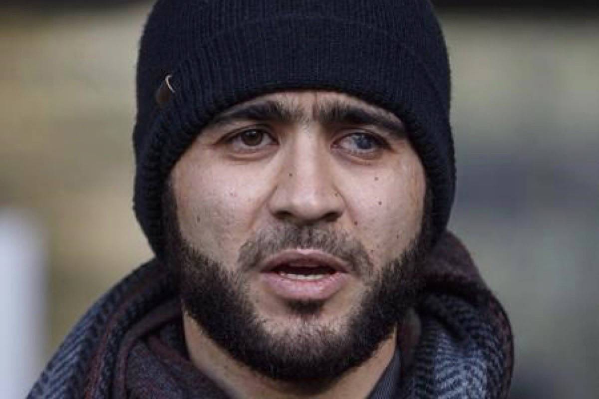 Omar Khadr speaks outside court in Edmonton on Thursday, December 13, 2018. An Alberta judge is expected to rule today on whether a war crimes sentence for former Guantanamo Bay prisoner Khadr should be declared expired.THE CANADIAN PRESS/Jason Franson