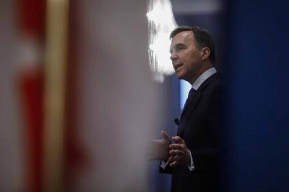 Federal Finance Minister Bill Morneau speaks to the Economic Club of Canada about the federal budget in Calgary, Alta., Monday, March 25, 2019.THE CANADIAN PRESS/Jeff McIntosh