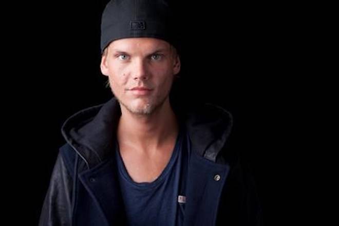 FILE - In this Aug. 30, 2013 file photo, Swedish DJ, remixer and record producer Avicii poses for a portrait, in New York. (Photo by Amy Sussman/Invision/AP, File)