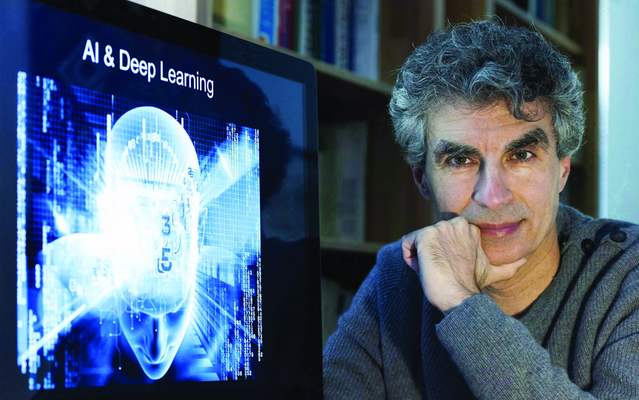 Computer Science professor Yoshua Bengio poses at his home in Montreal on November 19, 2016. Two artificial intelligence pioneers warn that unscrupulous or unethical uses of the technology risk undermining the public image of an area of research undergoing rapid change. (Graham Hughes/The Canadian Press)
