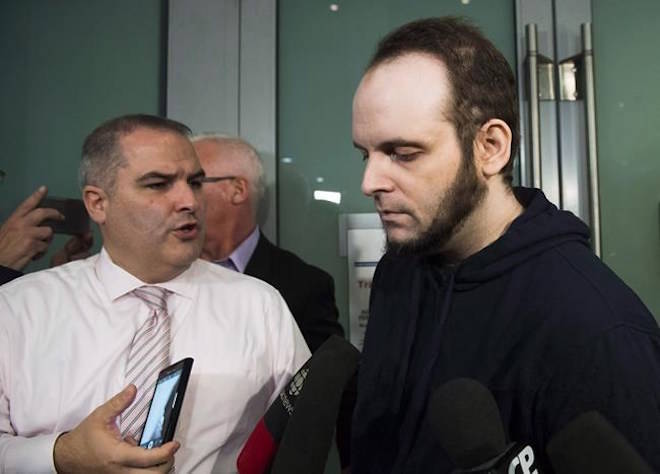 Joshua Boyle speaks to the media after arriving at the airport in Toronto on Friday, October 13, 2017. Boyle was arrested by Ottawa police late last month and made his first court appearance on New Year’s Day facing 15 charges, including eight counts of assault, two of sexual assault, two of unlawful confinement and one count of causing someone to take a noxious thing. THE CANADIAN PRESS/Nathan Denette