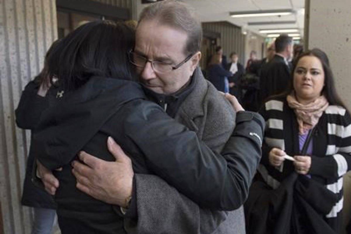 Glen Assoun is embraced by family members at Nova Scotia Supreme Court in Halifax on March 1, 2019. Glen Assoun’s lawyer says the wrongfully convicted Halifax man suffered “every single day” as he waited to be exonerated for a murder he didn’t commit — a wait that was prolonged for months as his case sat on former justice minister Jody Wilson-Raybould’s desk. David Lametti issued an order for a new trial on Feb. 28, just seven weeks after taking over as justice minister. The following day — after a five-minute new trial in which the prosecution presented no evidence — Assoun was a free man. THE CANADIAN PRESS/Andrew Vaughan